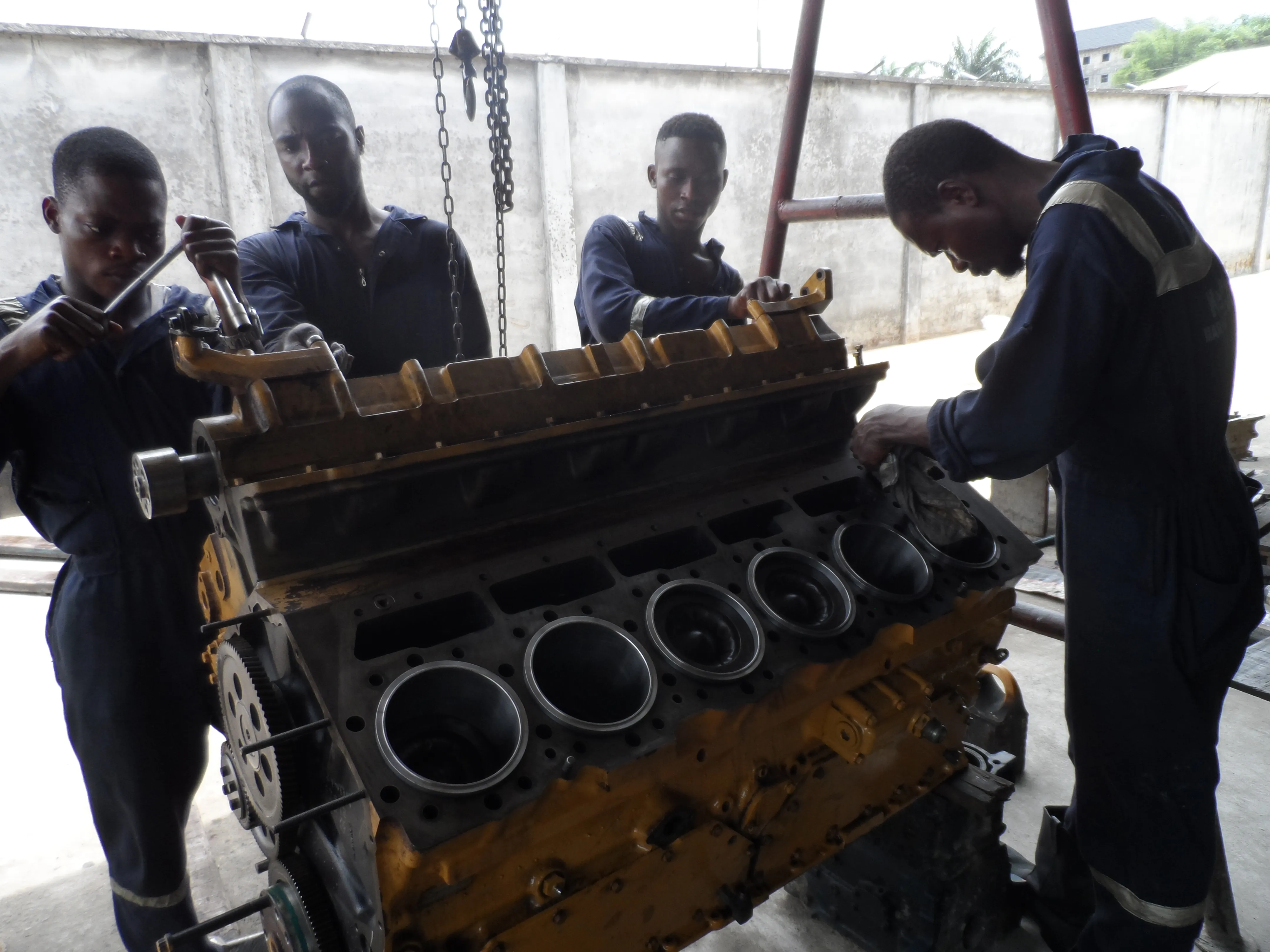 Kenoc enginners working on CaterpillarC32 engine